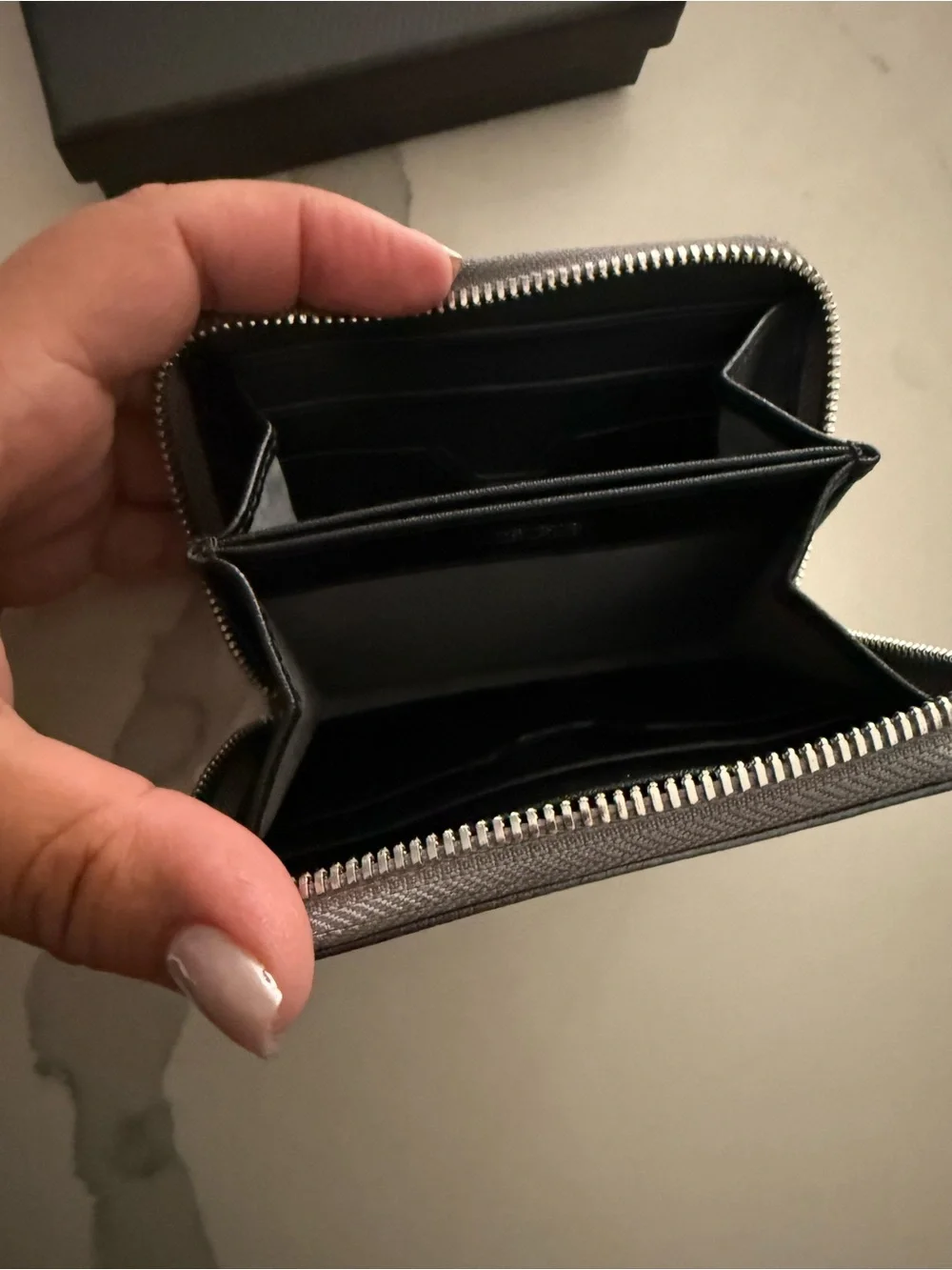 Tumi Gun Metal Wallet with Silver Logo and Zipper